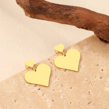 Brincos Coração Duplo Dourados em Aço Inoxidável